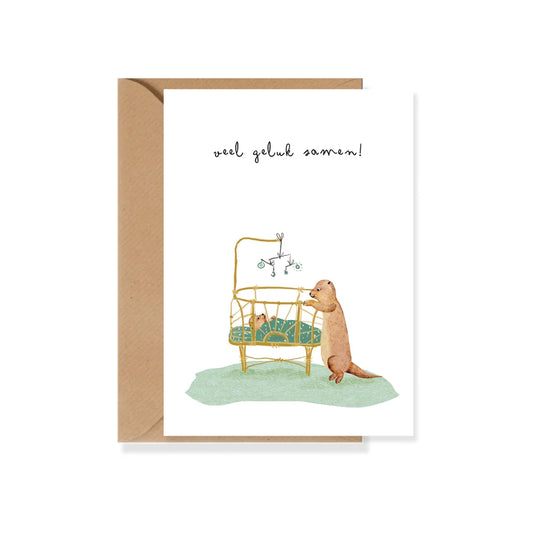 Ansichtkaart voor geboorte met baby in wiegje, otter en de tekst Veel geluk samen.