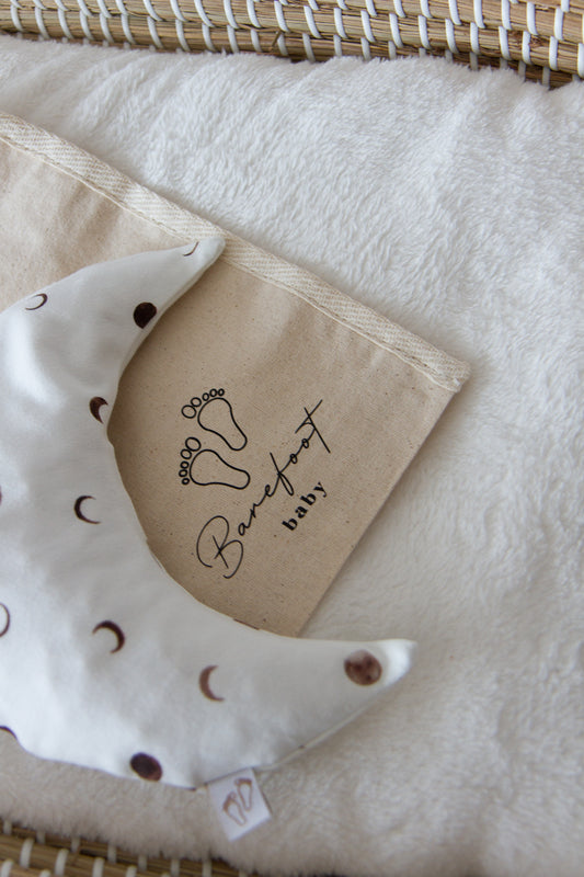 Comfy Luna warmtekussen voor baby’s met beautiful moon print in zachte tinten