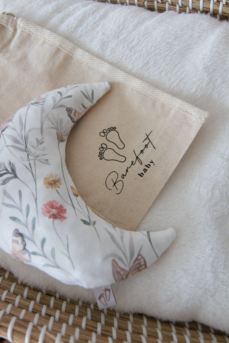 Comfy Luna warmtekussen voor baby’s met flowers and butterflies print in zachte tinten