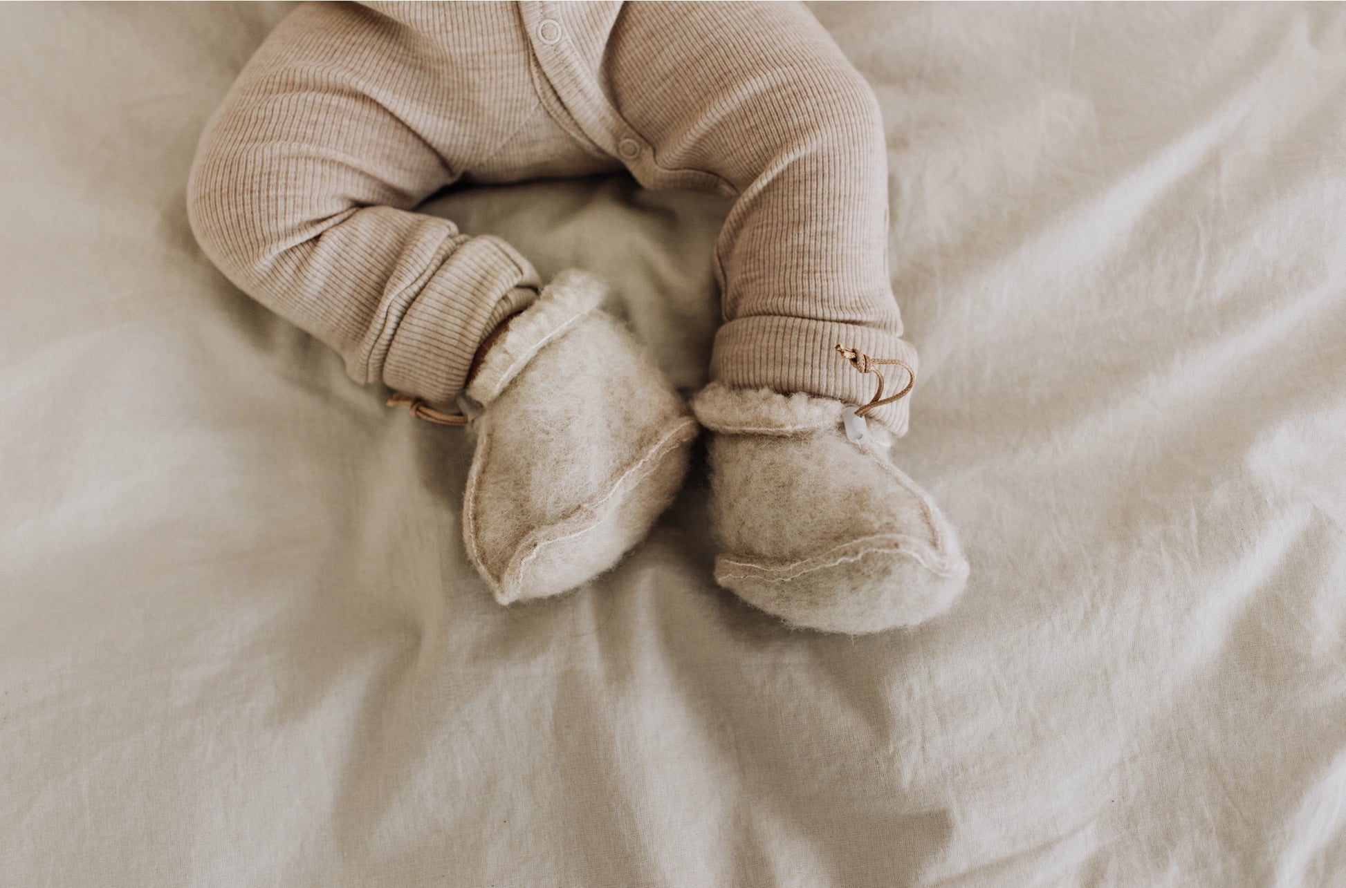 Merino wollen babyslofjes met elastische band die goed blijven zitten